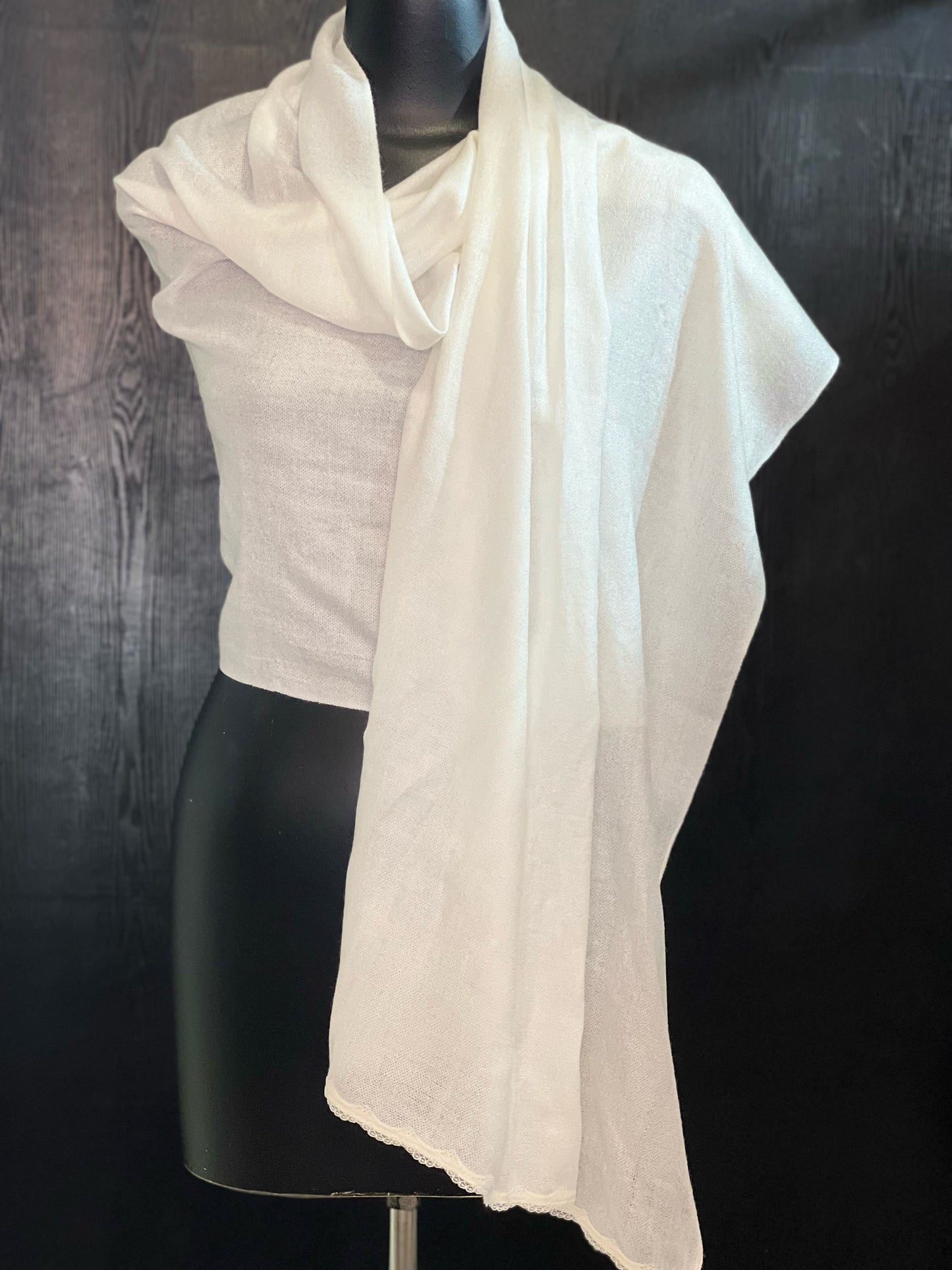 Pashmina with thin lace trim.